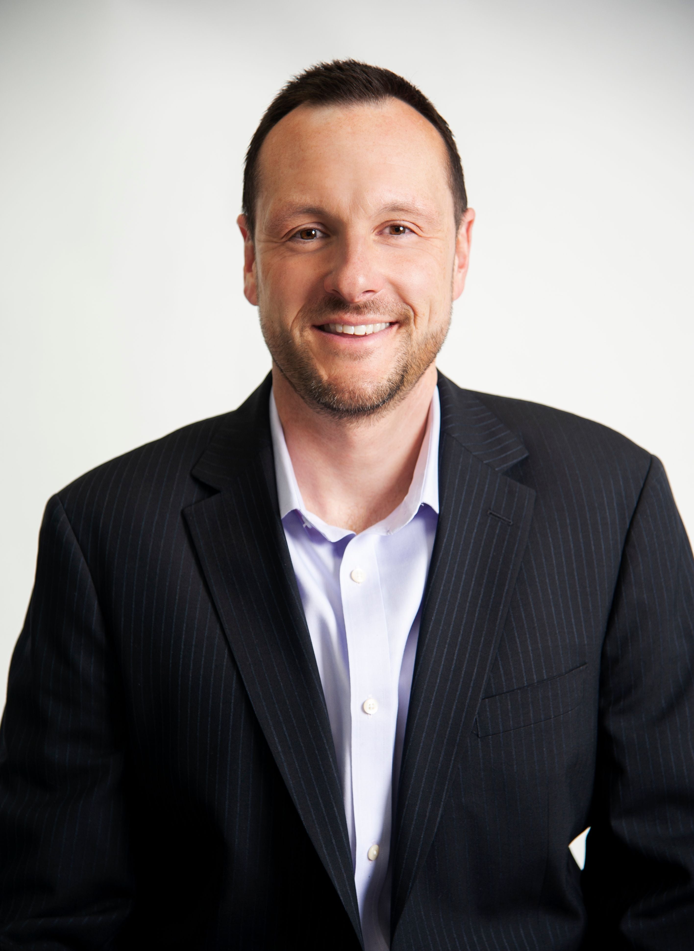 Headshot of Devin Fox, eCommerce Director specializing in Shopify strategy and customer journey optimization.