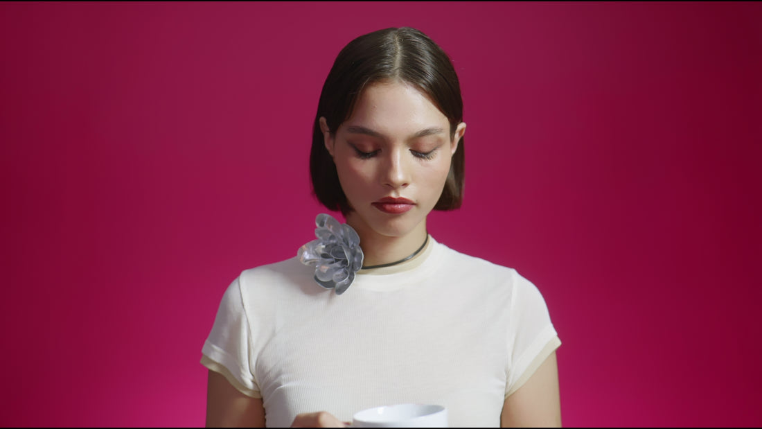 Person drinking coffee, representing a Karma Call thank-you gift card